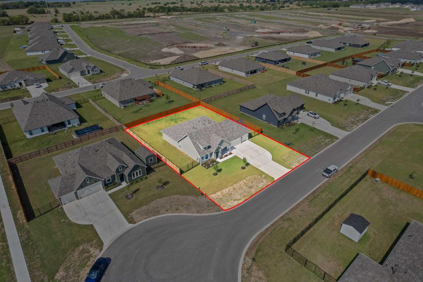 Aerial photograph of a Lockhart home with the property boundary outlined in orange