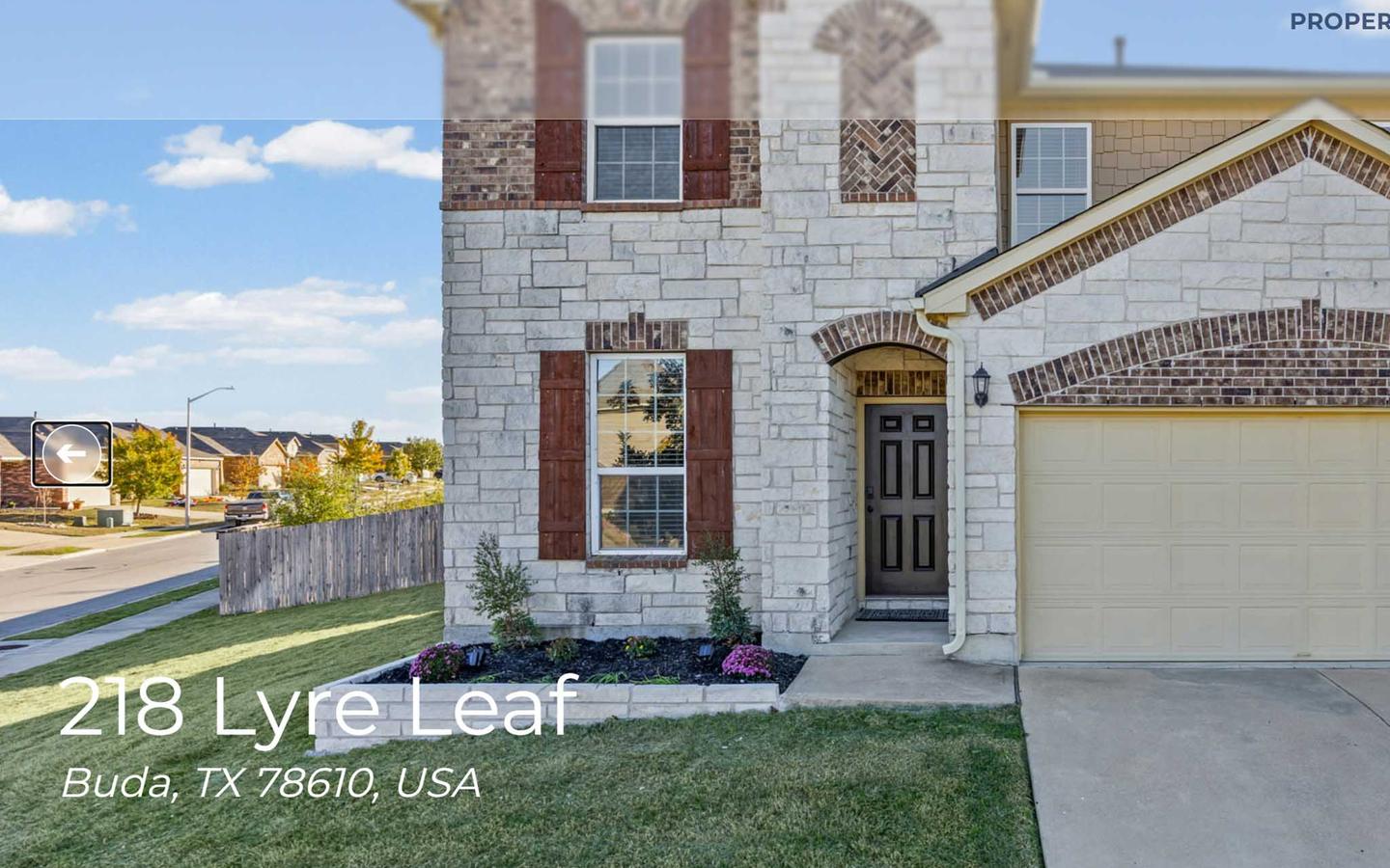 Single property marketing page showing a listing exterior with the address overlaid