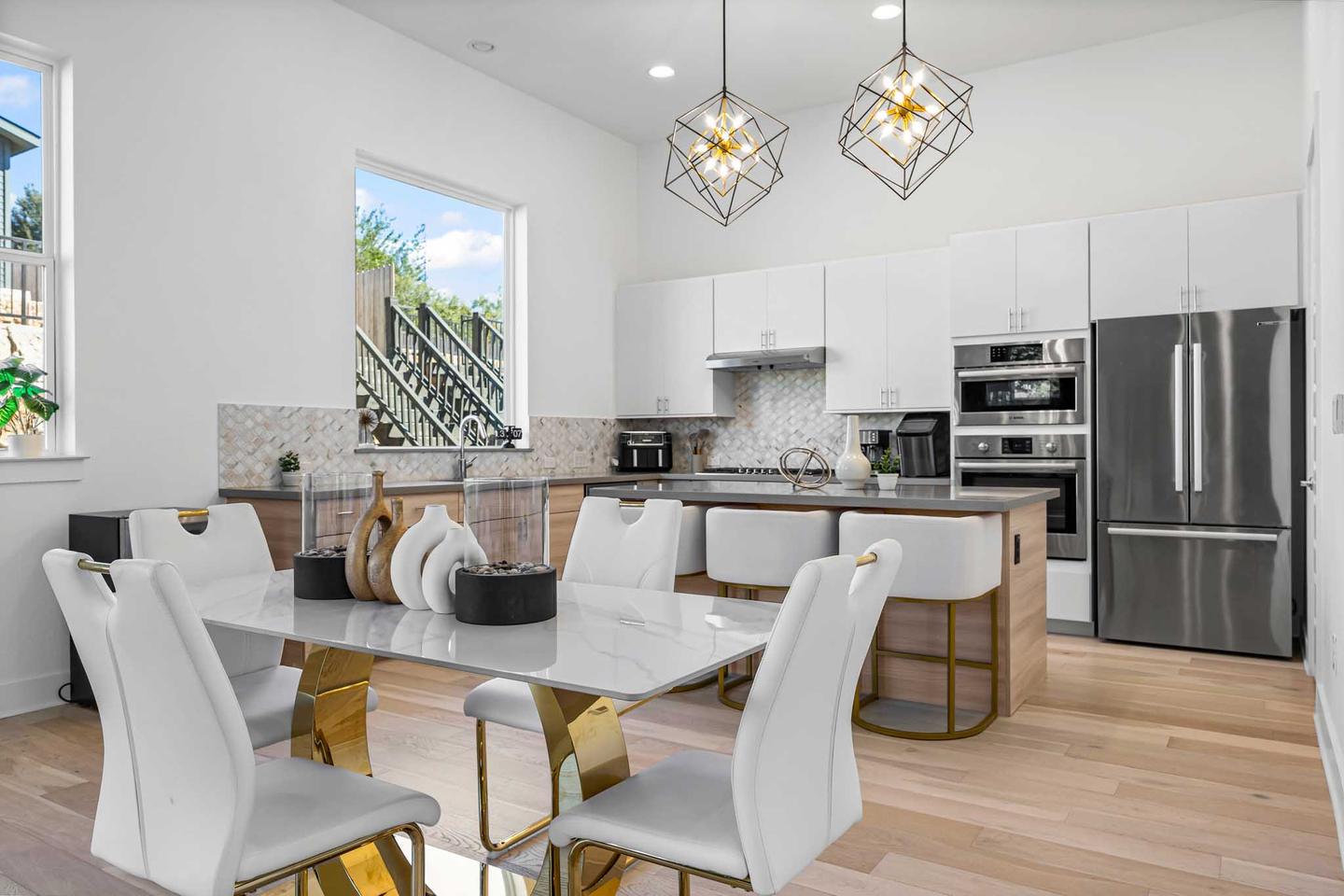 Matterport walkthrough view from a living room toward the kitchen and stairs, with circular markers on the floor showing where the buyer can step next