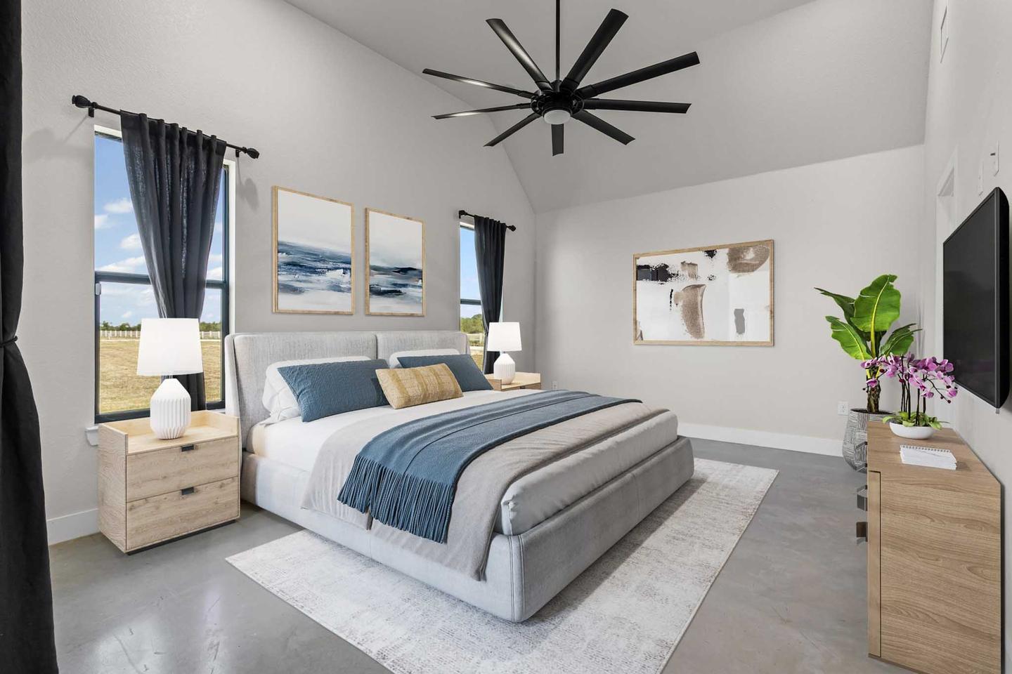 Bastrop bedroom digitally staged with a low bed, timber side tables and long curtains